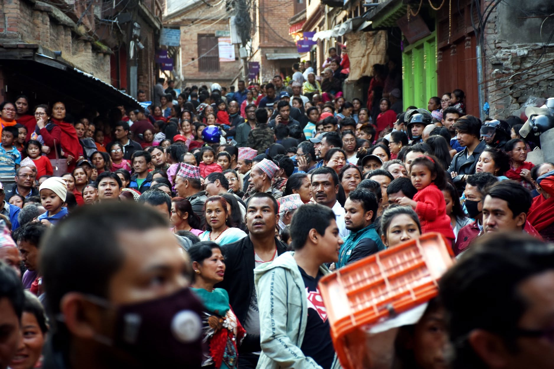 Crowd gathered in a Bhaktapur street during a festival