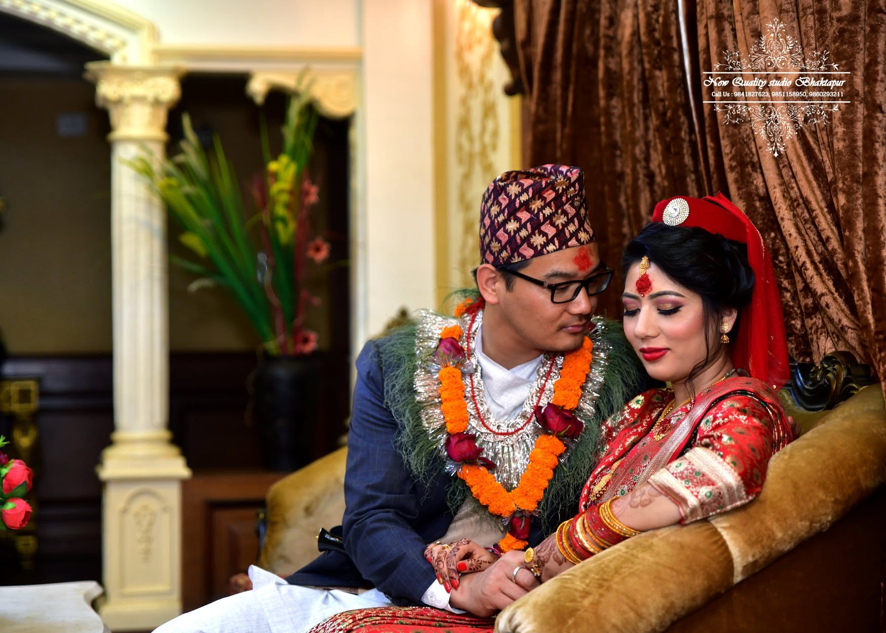 Bride and groom seated together after the Nepali wedding ceremony